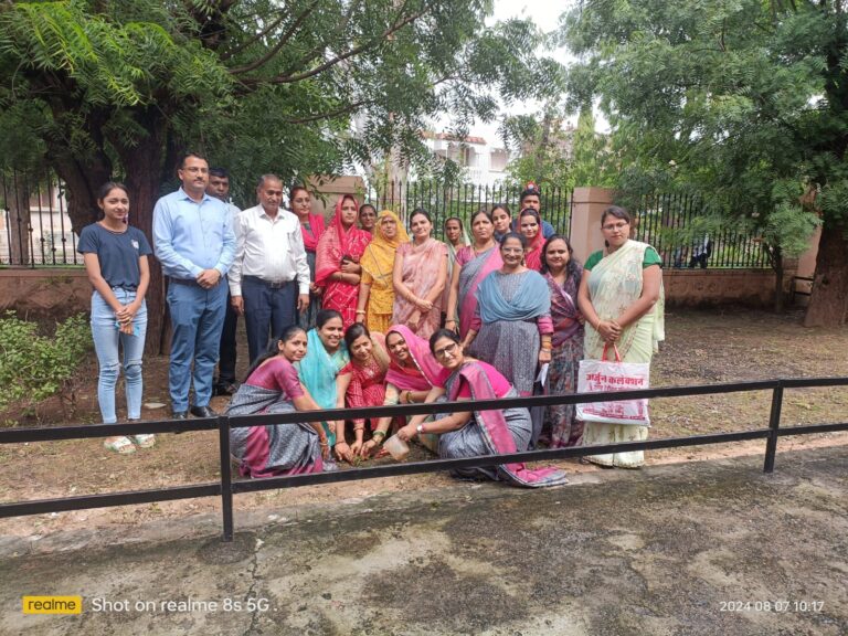 Mothers and students join hands for a greener future during the ‘Ek Podha Maa Ke Naam’ plantation drive, pledging to nurture the plants.